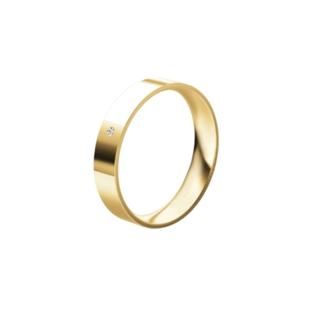 Una alianza cinta en oro amarillo con diamante talla brillante. Espesor: 4 mm. Peso: 3.5 gr.