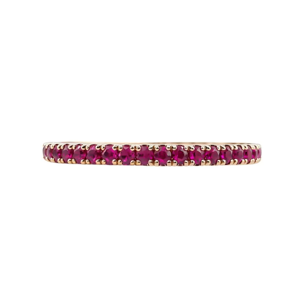 Anillo en oro rosa con rubíes talla brillante.