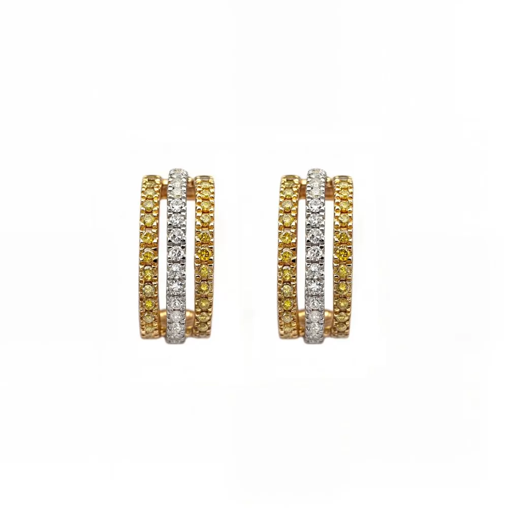 Argollas en oro amarillo con diamantes talla brillante y diamantes Fancy Yellow talla brillante. 