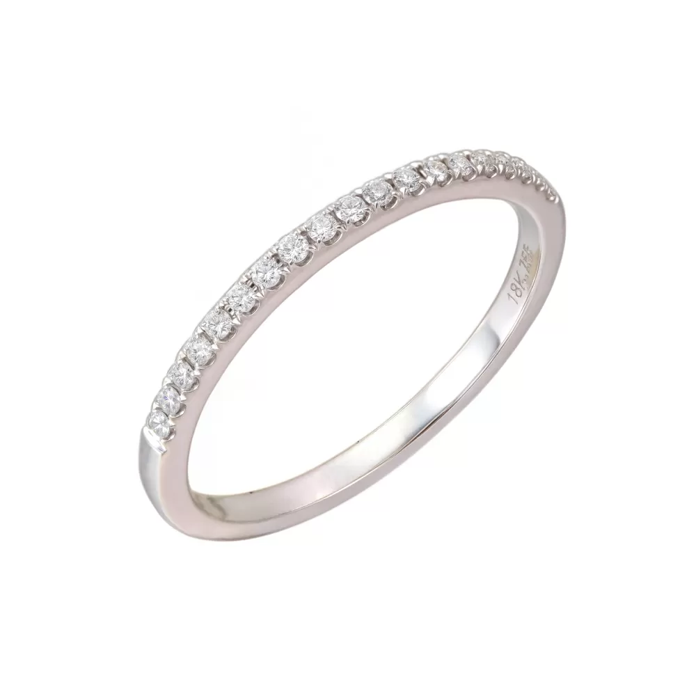 Anillo medio sinfín en oro blanco con diamantes talla brillante.