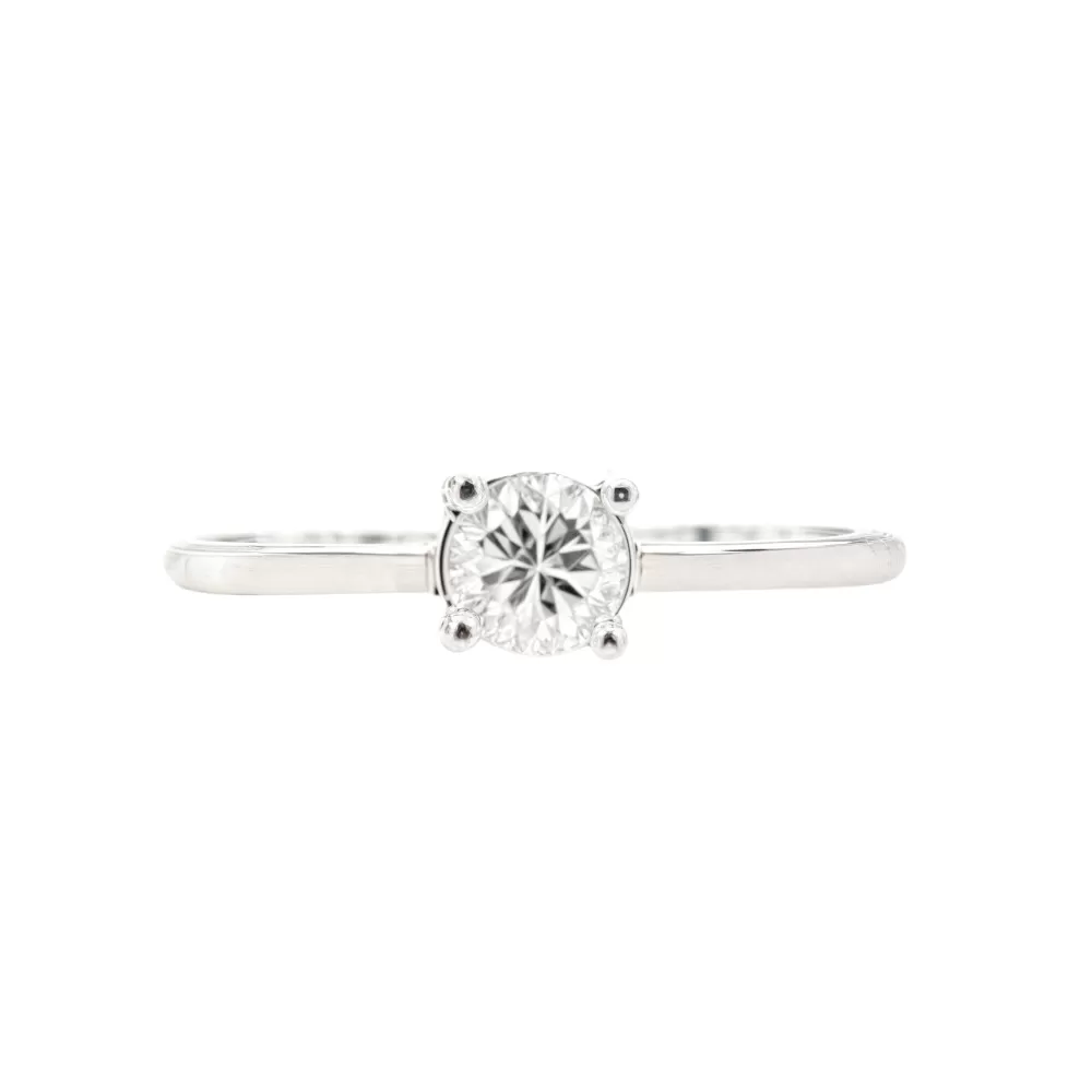 Anillo Solitario en oro blanco con diamante talla brillante (0.36 ct, color  J, pureza I1).