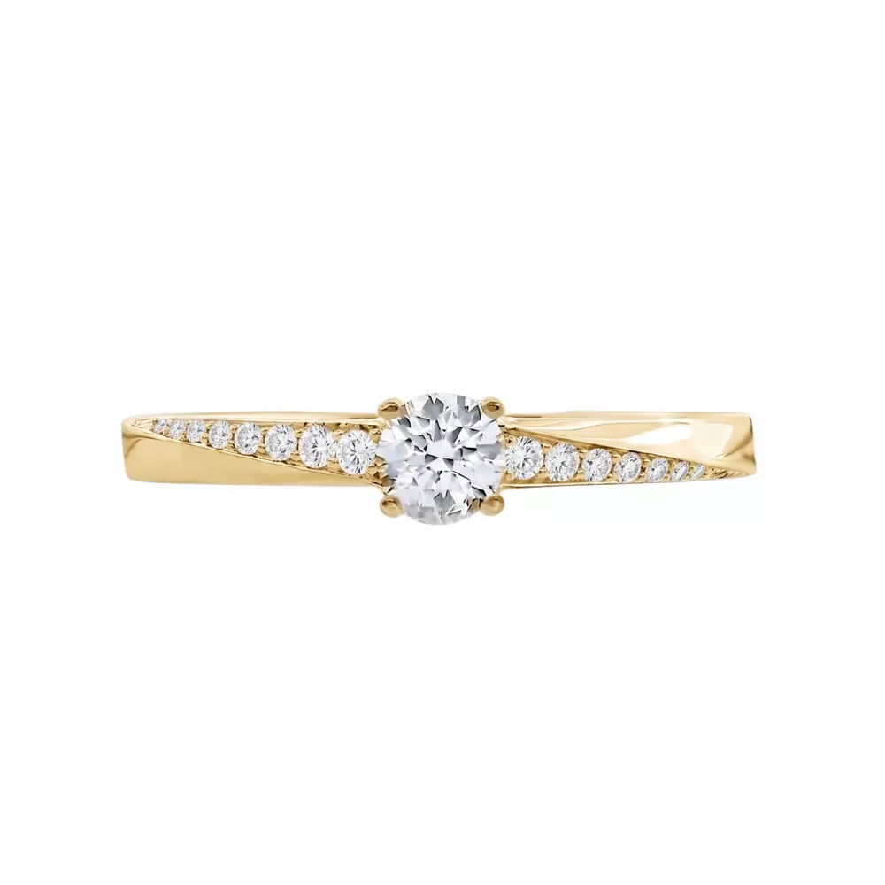 Anillo de Compromiso en oro amarillo con diamantes talla brillante (0.19 ct, color E, pureza VS1).