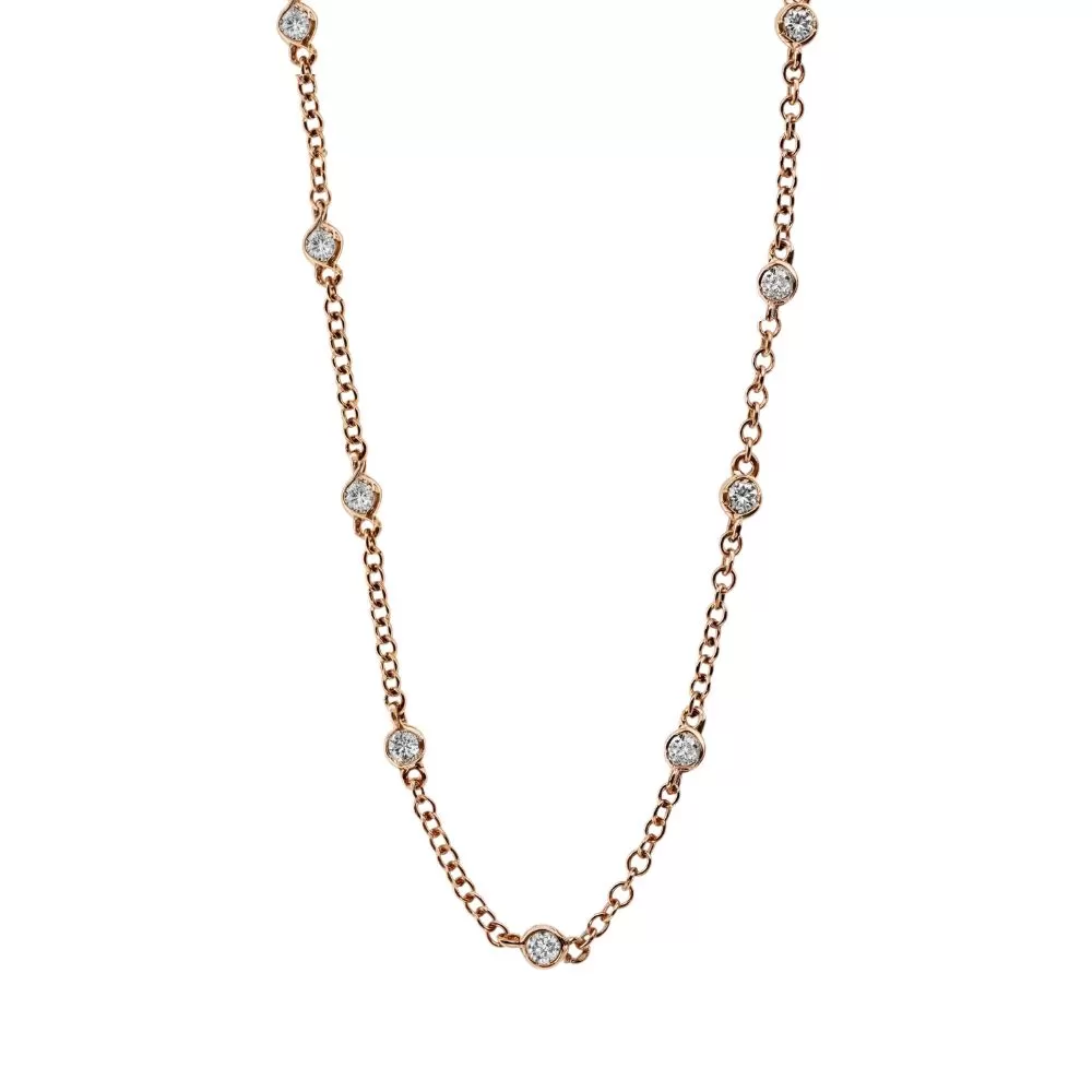 Collar en oro rosa con diamantes talla brillante.