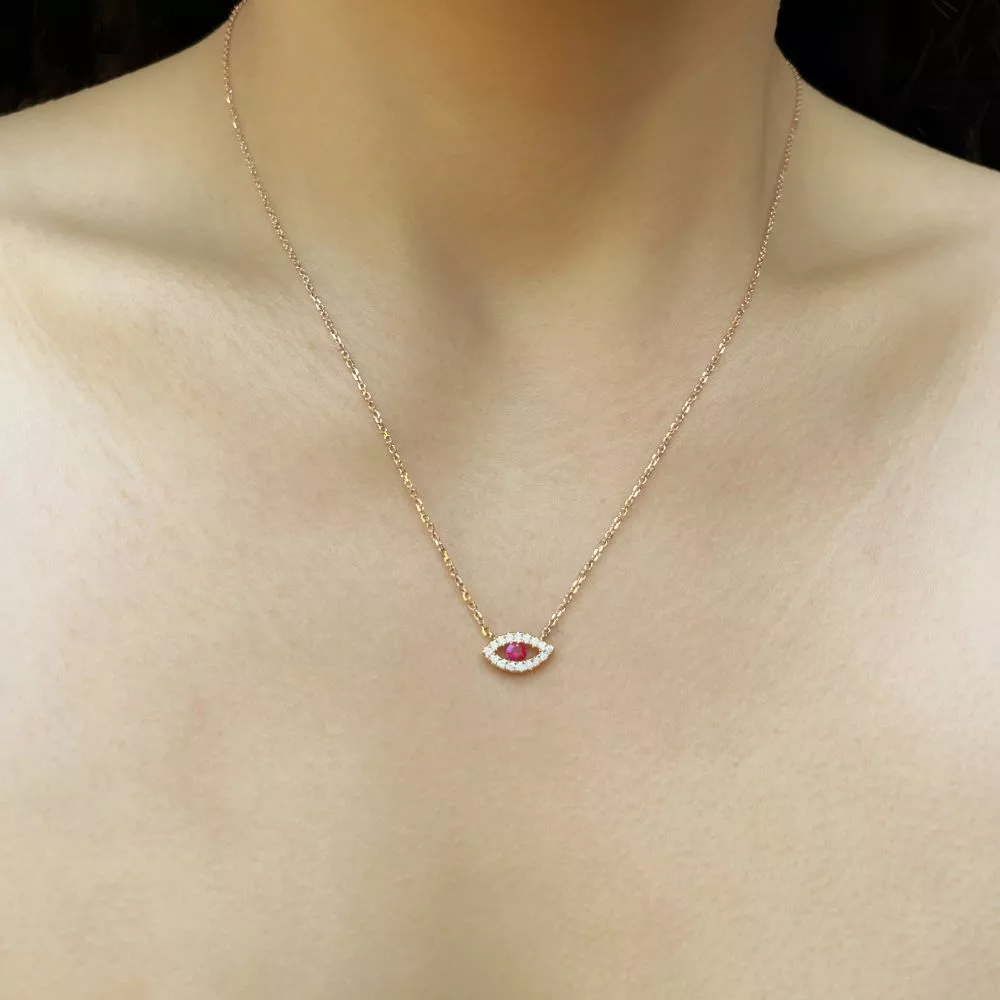 Necklace in rose gold set with brilliant-cut ruby and brilliant-cut diamonds.