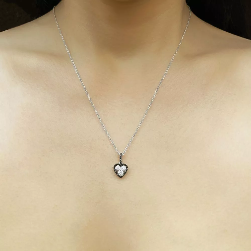 Necklace in white gold set with Fancy Black and colorless brilliant-cut diamonds.